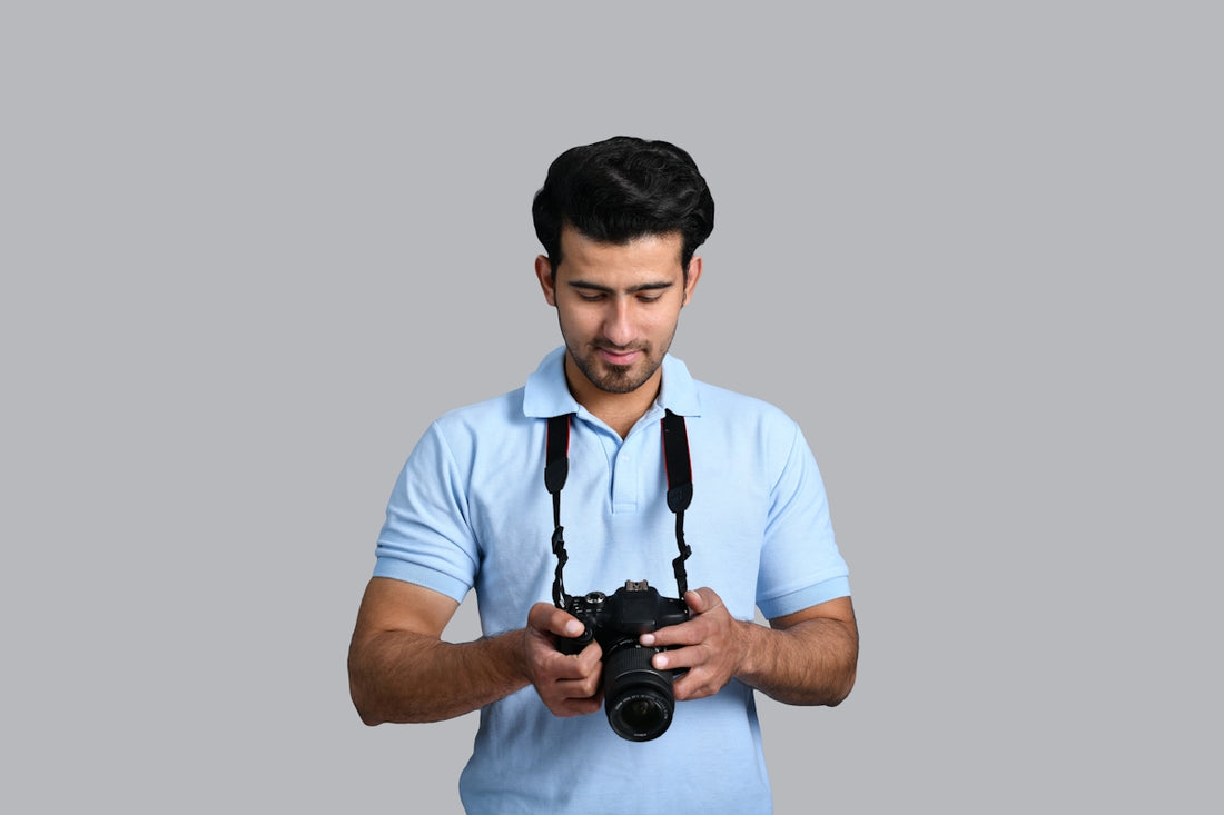 a man holding a camera